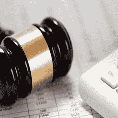 Image of a gavel and law books representing the legal industry